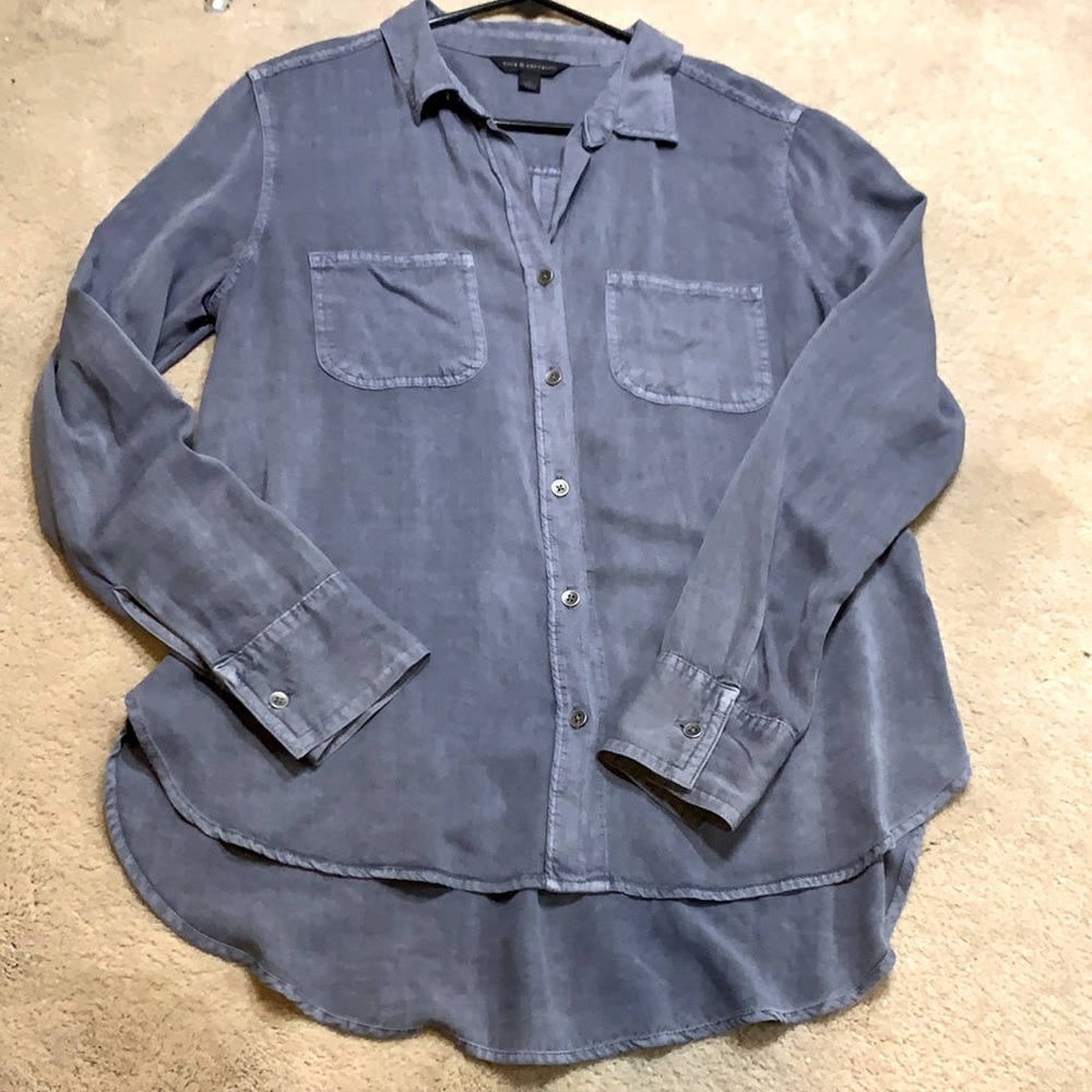 Rock Republic button down blue denim top/blouse. Longer in back. Size M